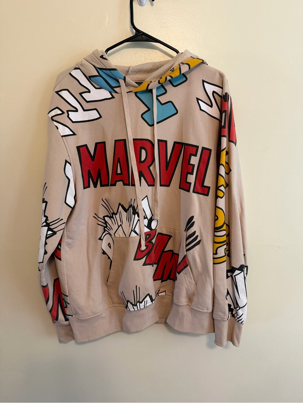 Marvel Beige V-Neck Sweater with Red Logo and Multicolor Comic Print